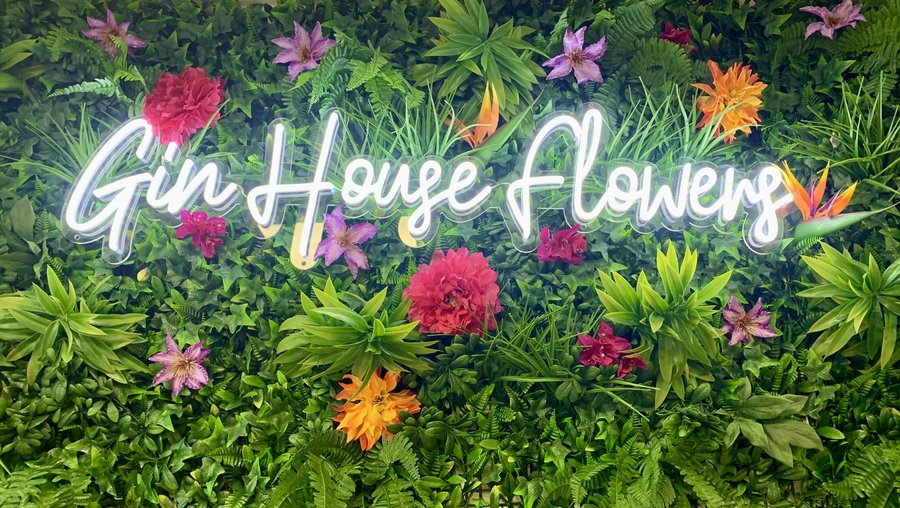 Gin House Flowers shop sign on High Street, Histon
