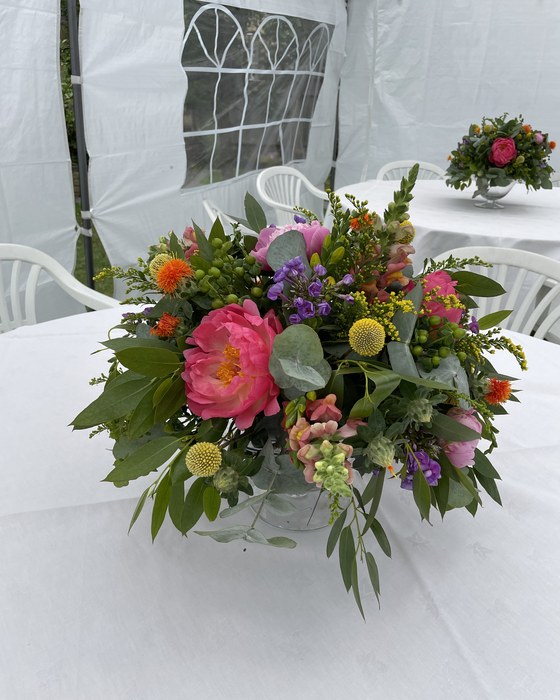 Table centrepiece in a marquee