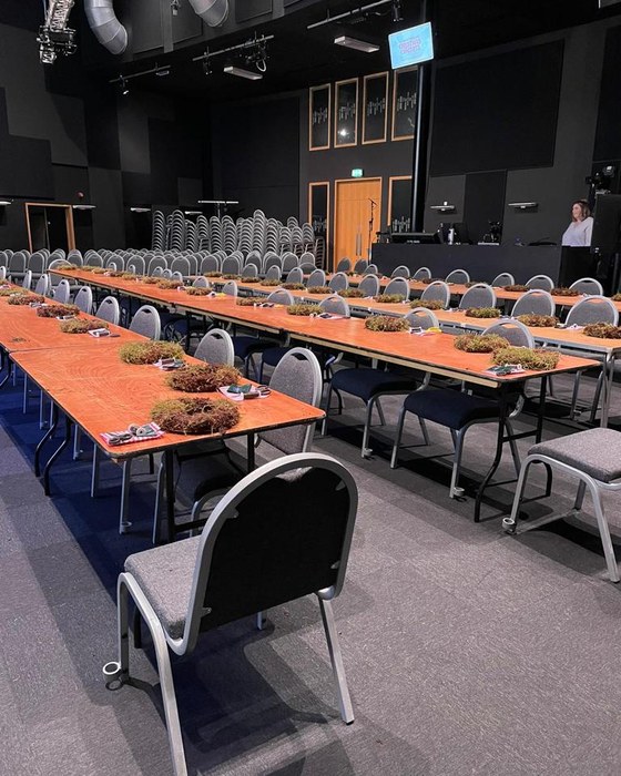 Tables laid for a large wreath workshop