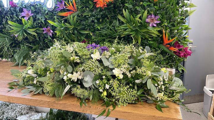 White and green coffin spray